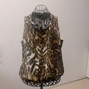 Milano sleeveless top, size XL.